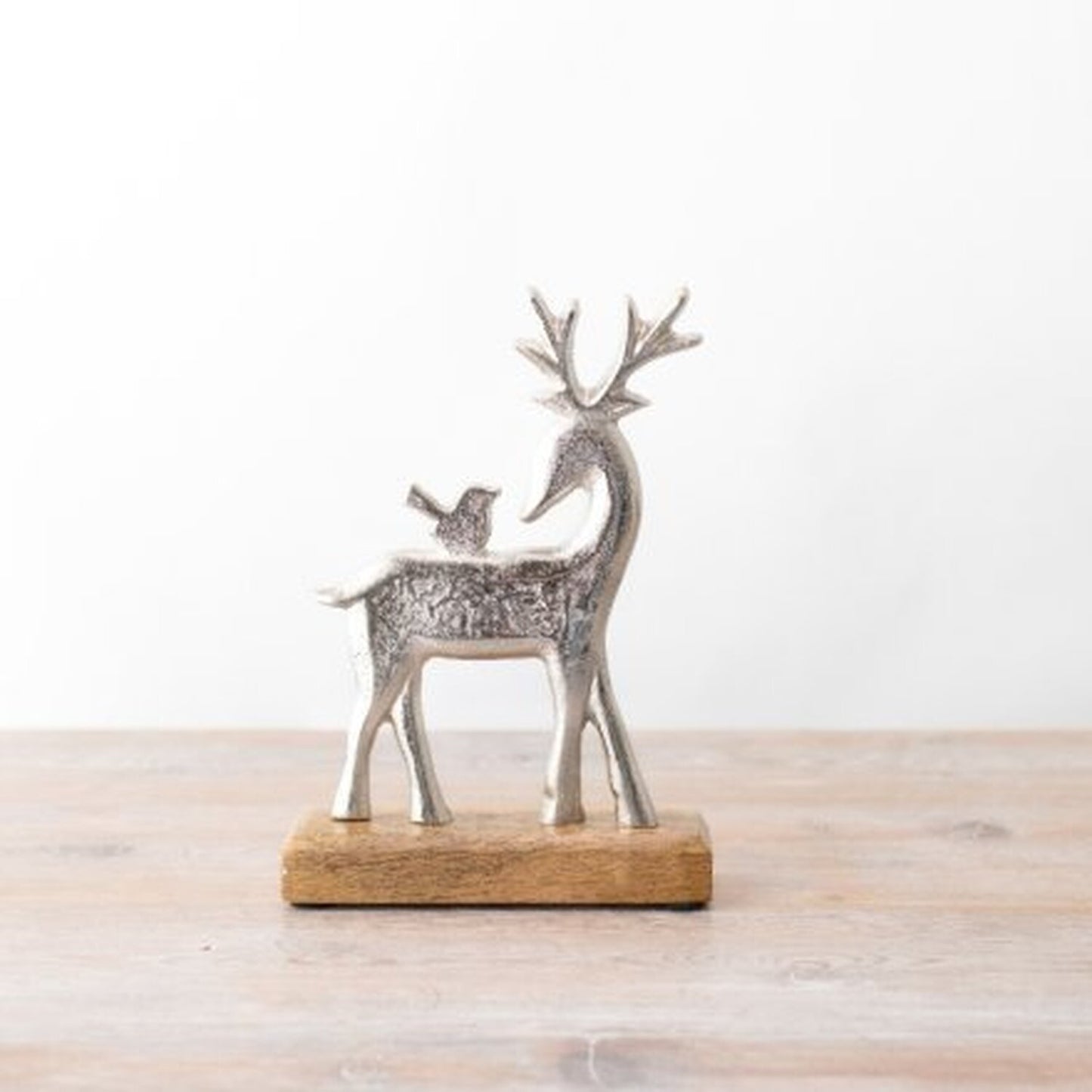 Metal Reindeer On Wooden Base